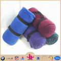 Wholesale cheap handle attached 100% Polyester Polar Fleece Travel Blanket